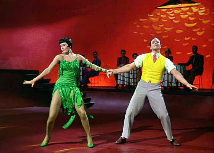 Gene Kelly and Cyd Charisse from Singin in the Rain, posing exuberantly in the middle of their Technicolor jazz/tap. They look incredible. Each of them is so gender. 