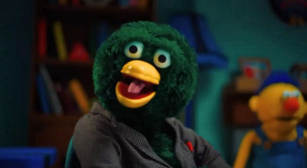 the green duck character from “don’t hug me I’m scared”