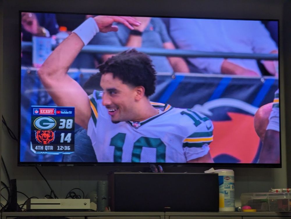 My team, the Green Bay Packers, is trouncing their rival, the Chicago Bears 38-14 with 12 minutes remaining to play.