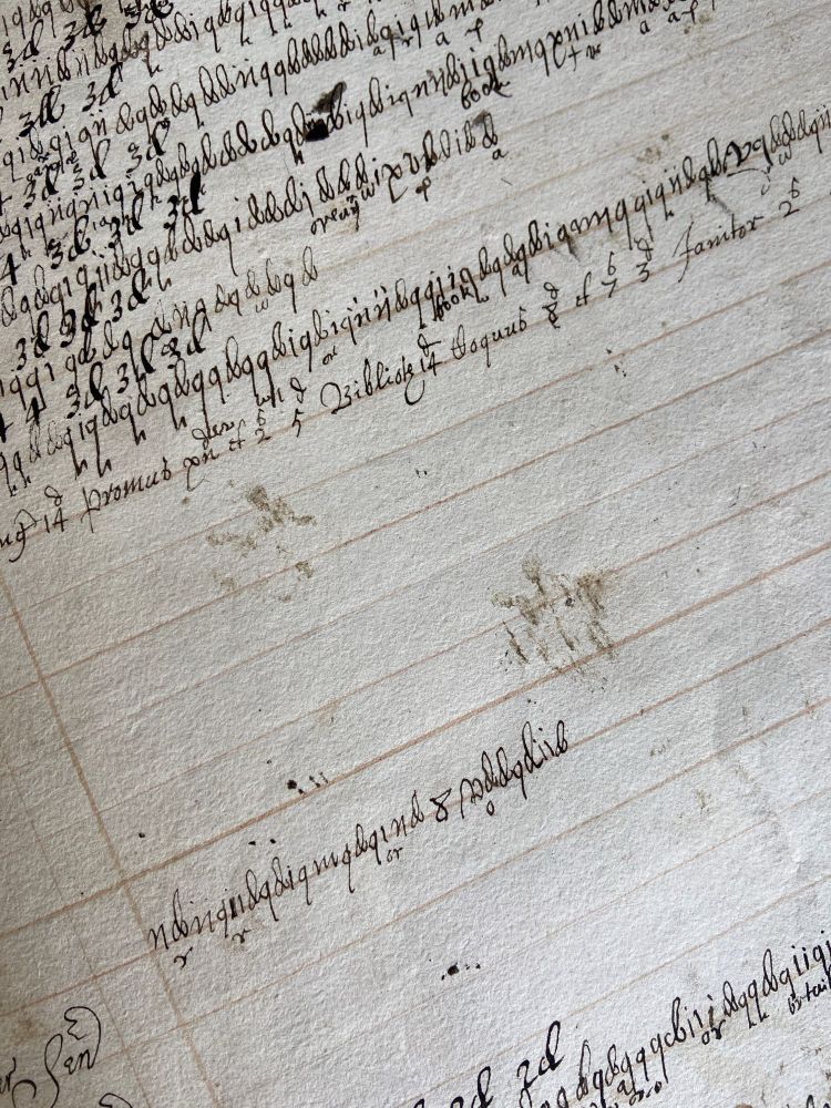 1691 Magdalen Hall Account Book with paw prints visible on the page