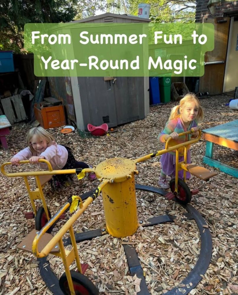 Two kids playing on a yellow wheelie-go-round