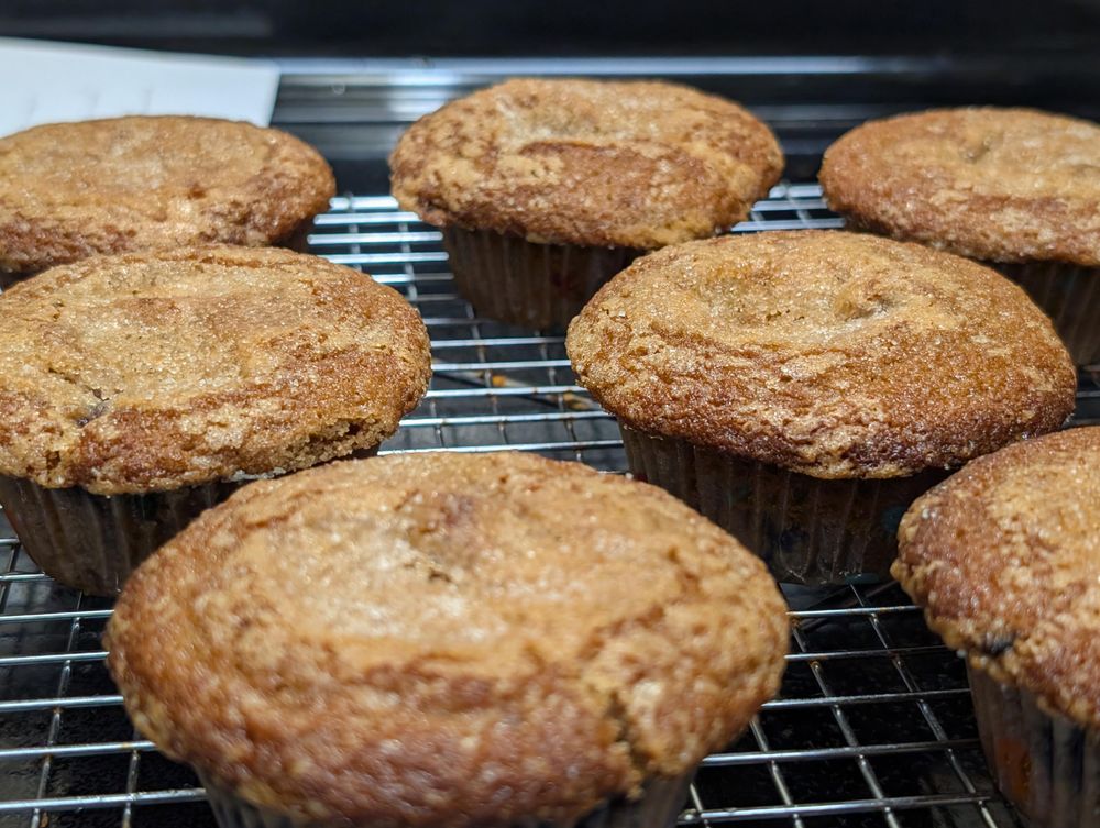Closeup showing the crispy bumpy texture over the top of each rich golden brown muffin!