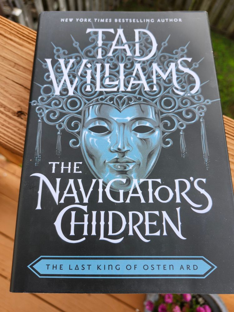 Cover of the book "The Navigator's Children" by Tad Williams. Depicts a silver mask of a woman's face.
