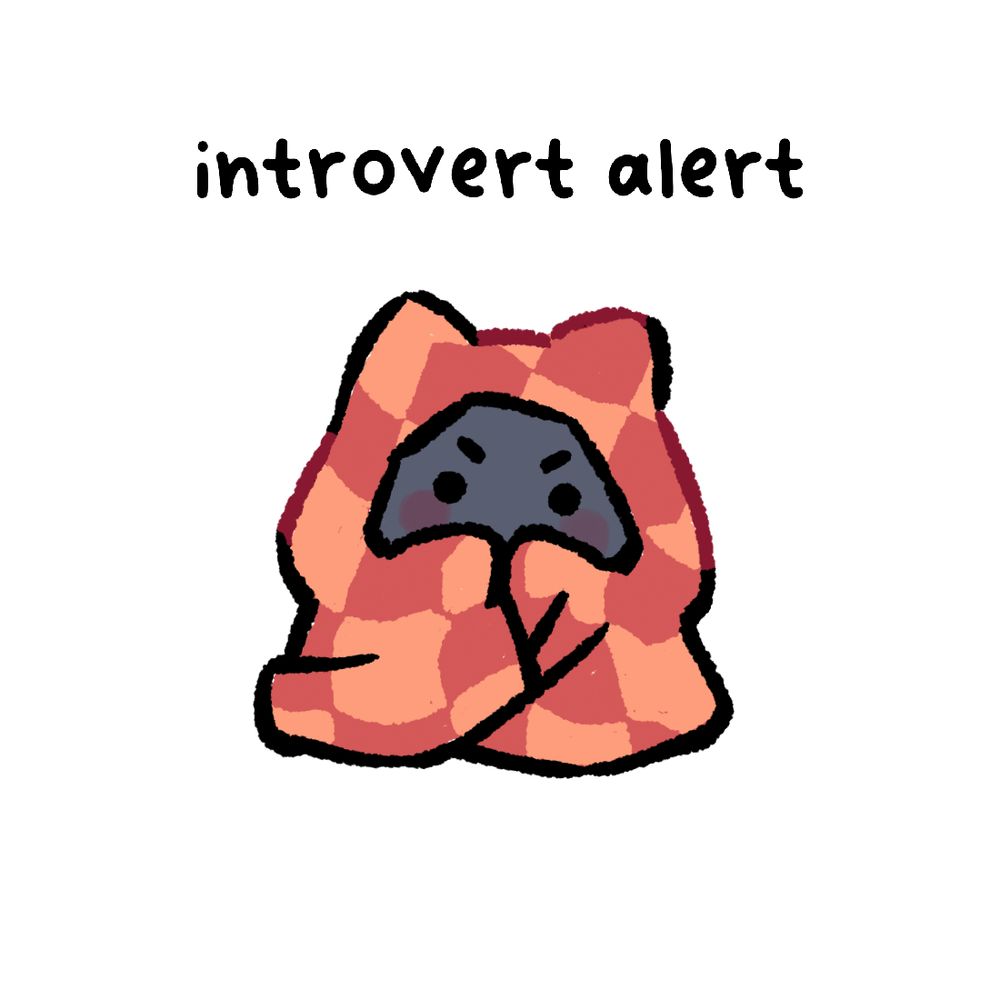 a black cat hiding under a blanket with the text 'introvert alert' above