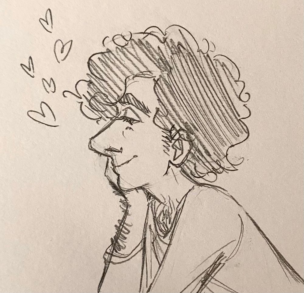 Drawing of a guy leaning forward with his chin in his hand, a soft, adoring smile on his face.