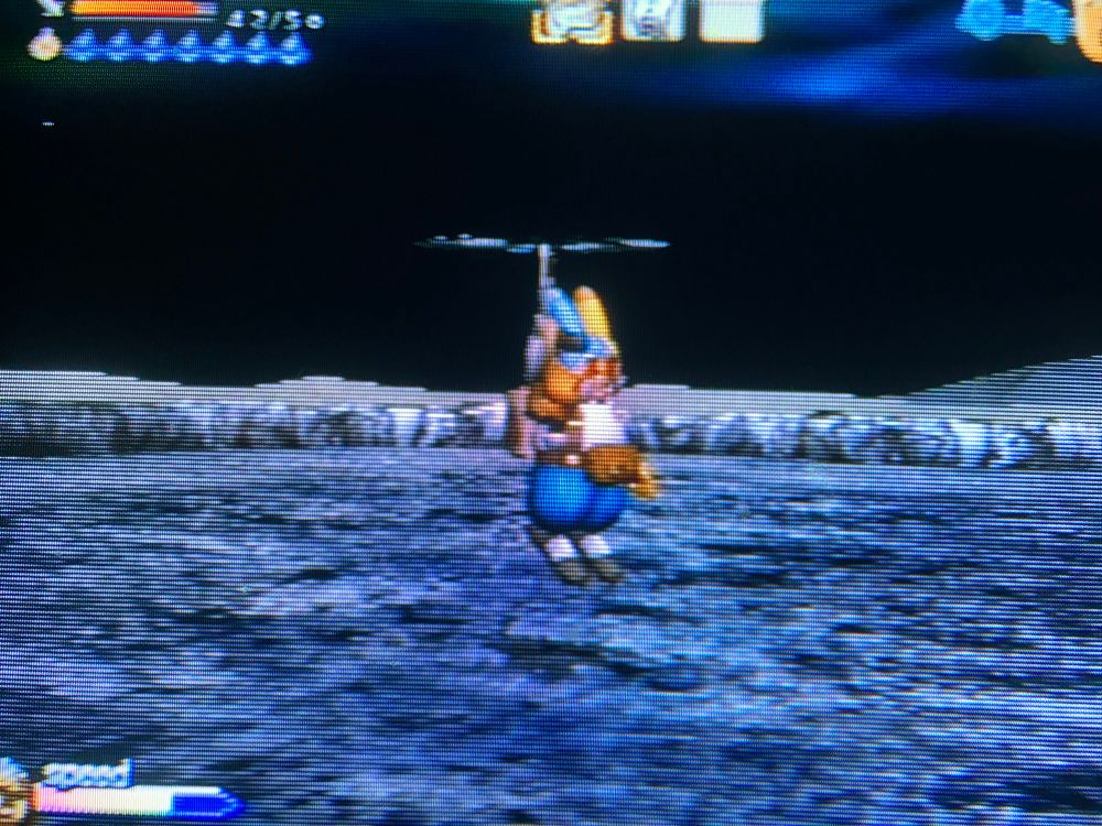 The character from above he’s floating using a helicopter Jetpack thing while holding a machine gun