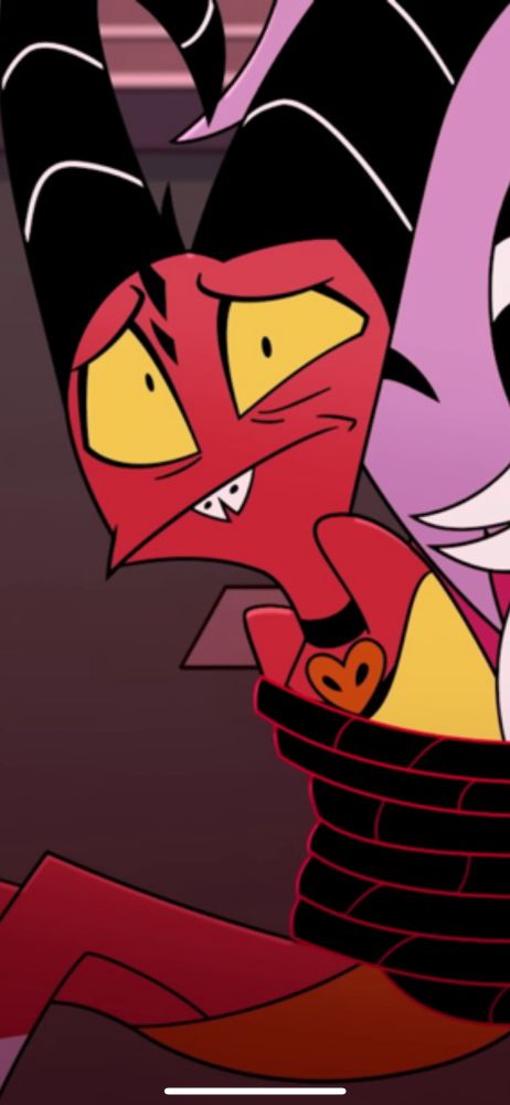 Zoomed in screenshot of a random intern character in Helluva Boss who strikes resemblance to Blitzo, the show’s main antagonist 