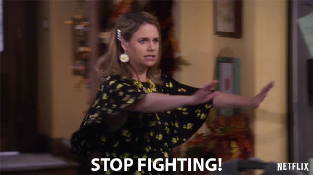 a woman says " stop fighting " in a netflix advertisement