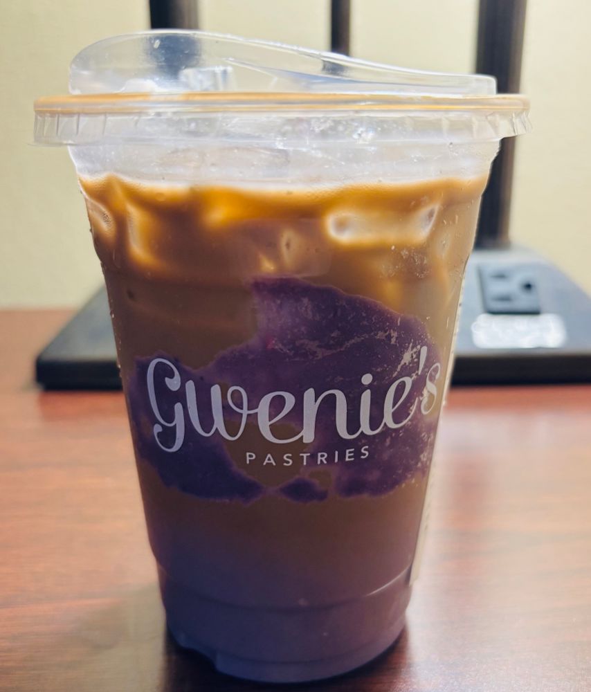 A close-up of an iced ube latte from Gwenie’s pastries in Arlington, VA 