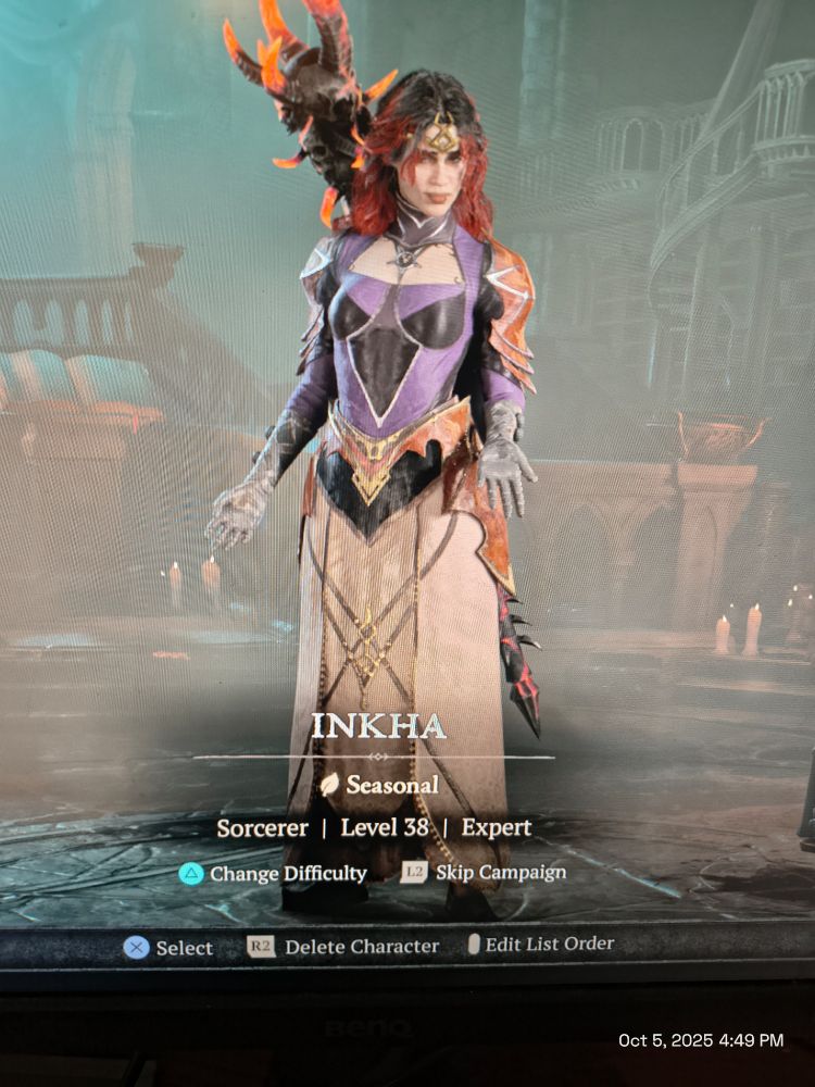 Picture from Diablo 4 character screen of a sorceress character with black and red hair, purple top and white skirt. Name is Inkha. Level 38 on expert difficulty 