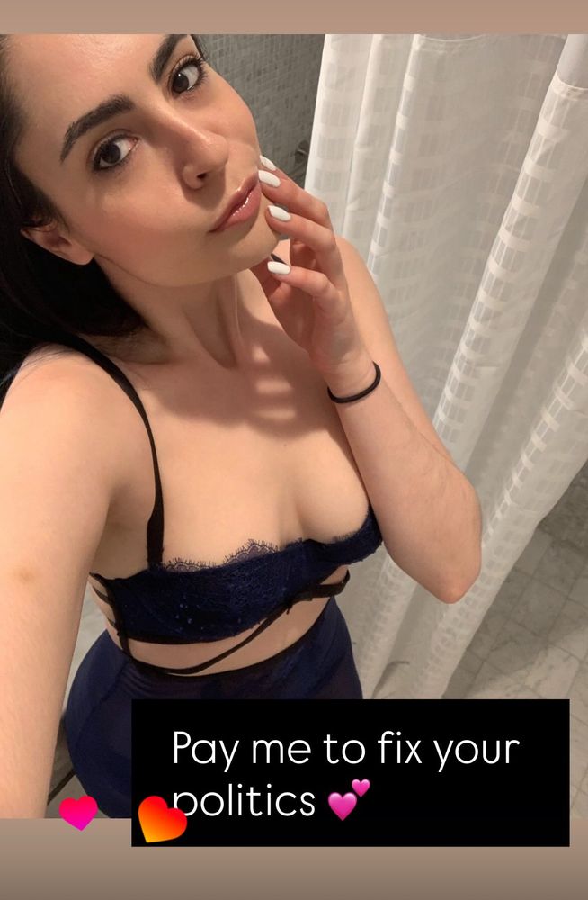 Second screenshot from the same story of me and a cute lingerie that looking at the camera with the caption “Pay me to fix your politics”