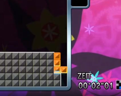Screenshot from the Partice Mode in "Tetris: The Grandmaster 4".
It shows gameplay of an L-piece being placed to only clear 1 row instead of 3 rows.