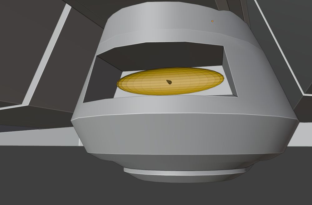Much closer look at the deflector dish. It's a wide oval like the NX-01 Enterprise, and bright brass like the TOS Enterprise, with a very pointy antenna in the center like the Discovery-era ship that it is. Hopefully this will be suitable for a part that was never shown on screen.