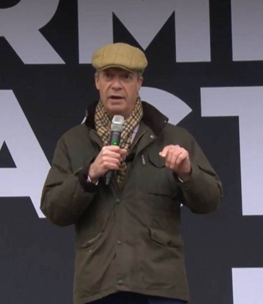 Nigel farage in Barbour jacket and cap