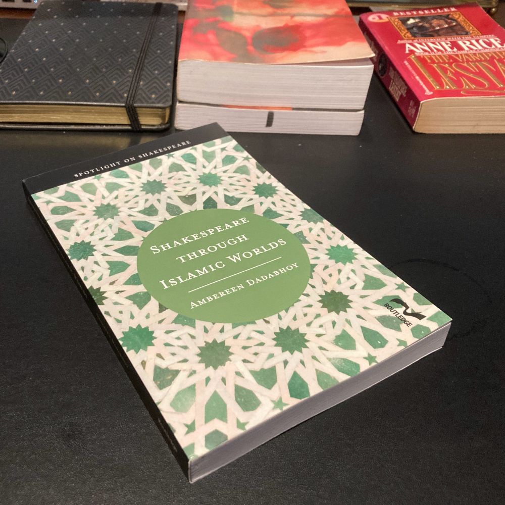 Paperback book, white cover with green geometric pattern. Shakespeare Through Islamic Worlds by Ambereen Dadabhoy.