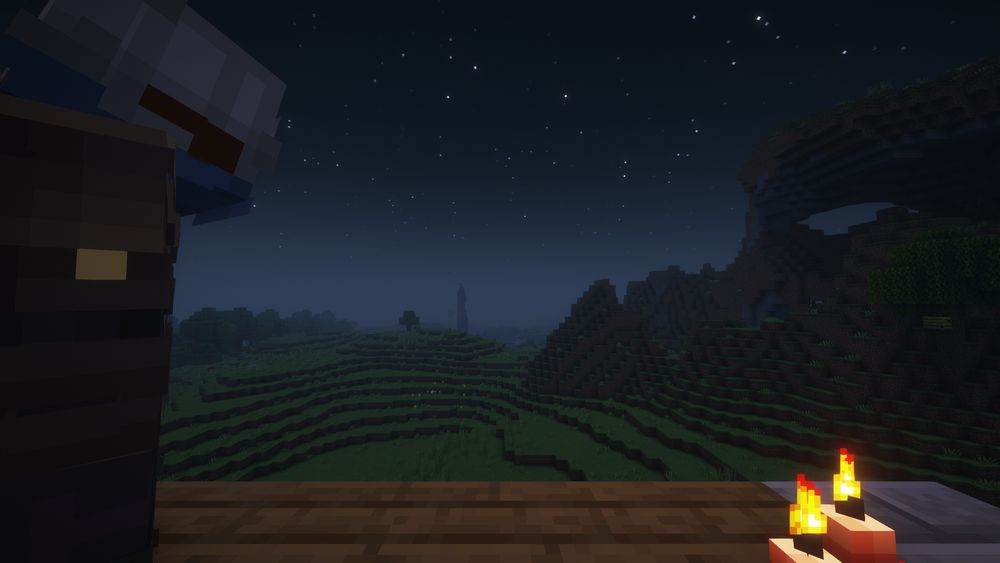 [Minecraft, in game screenshot] A photo from Dorian's camera; The two are on the roof of the house late at night, relaxing by candlelight. In the distance a sculk spire stretches into the sky. This photo is titled "Date Night"
