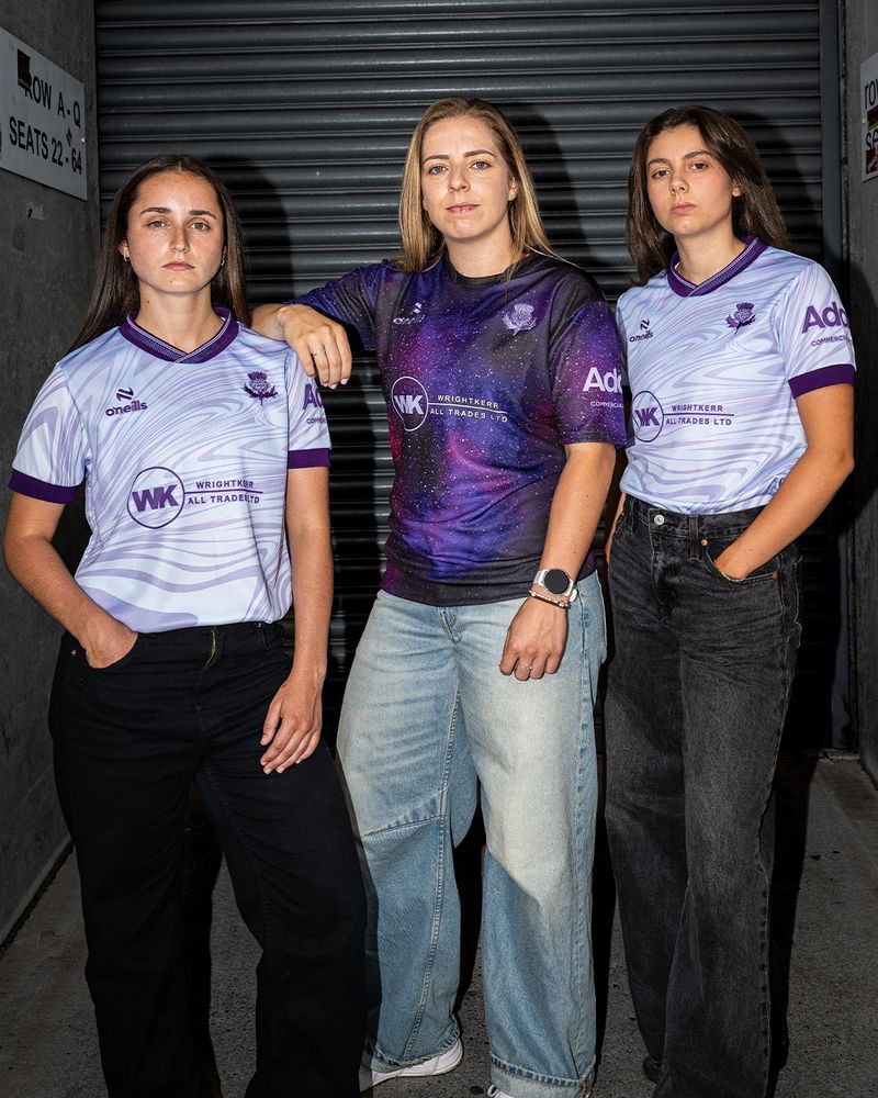 Partick Thistle players modelling the new lilac wavy away kit and starry night sky goalkeeper kit