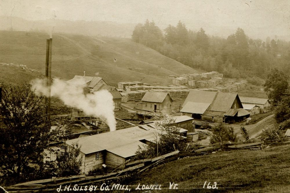 black and white postcard image of Lowell, Vermont, circa 1920. Original here: https://oldstonehousemuseum.org/glimpse-of-the-past-19-lowell-vermont/