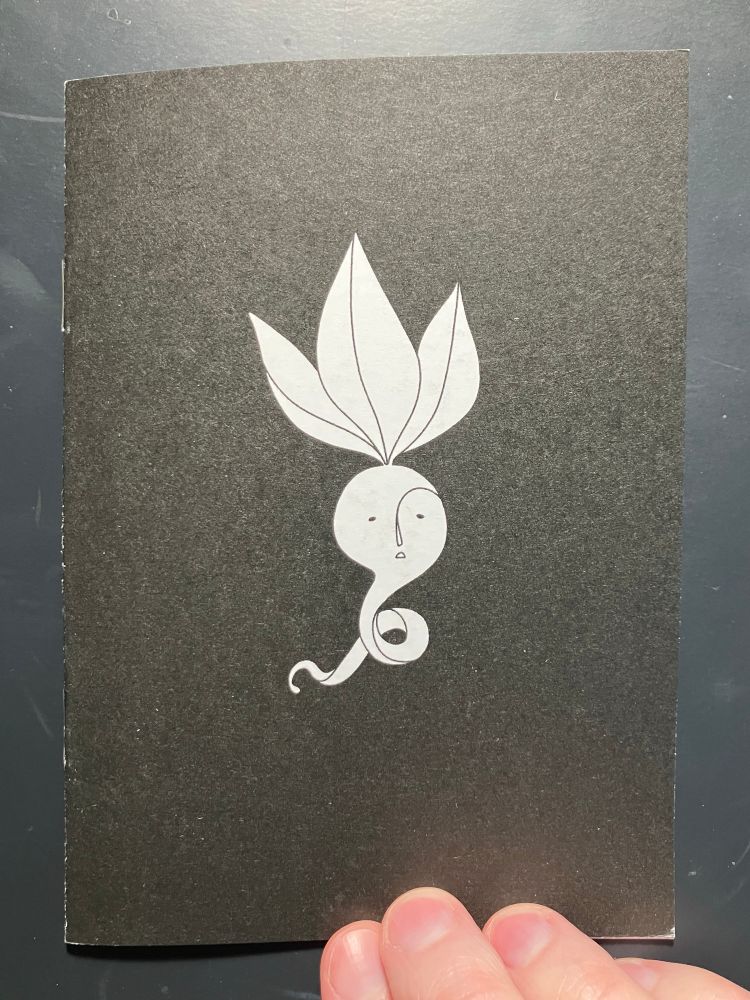 A zine with a black cover, and a sad, turnip-like entity based on some Medieval marginalia.