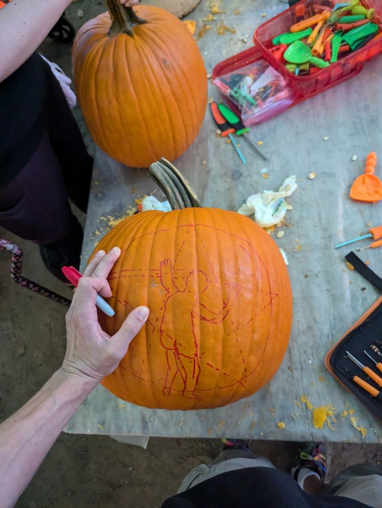 A rough sharpie sketch of Rush's starman logo on a pumpkin 