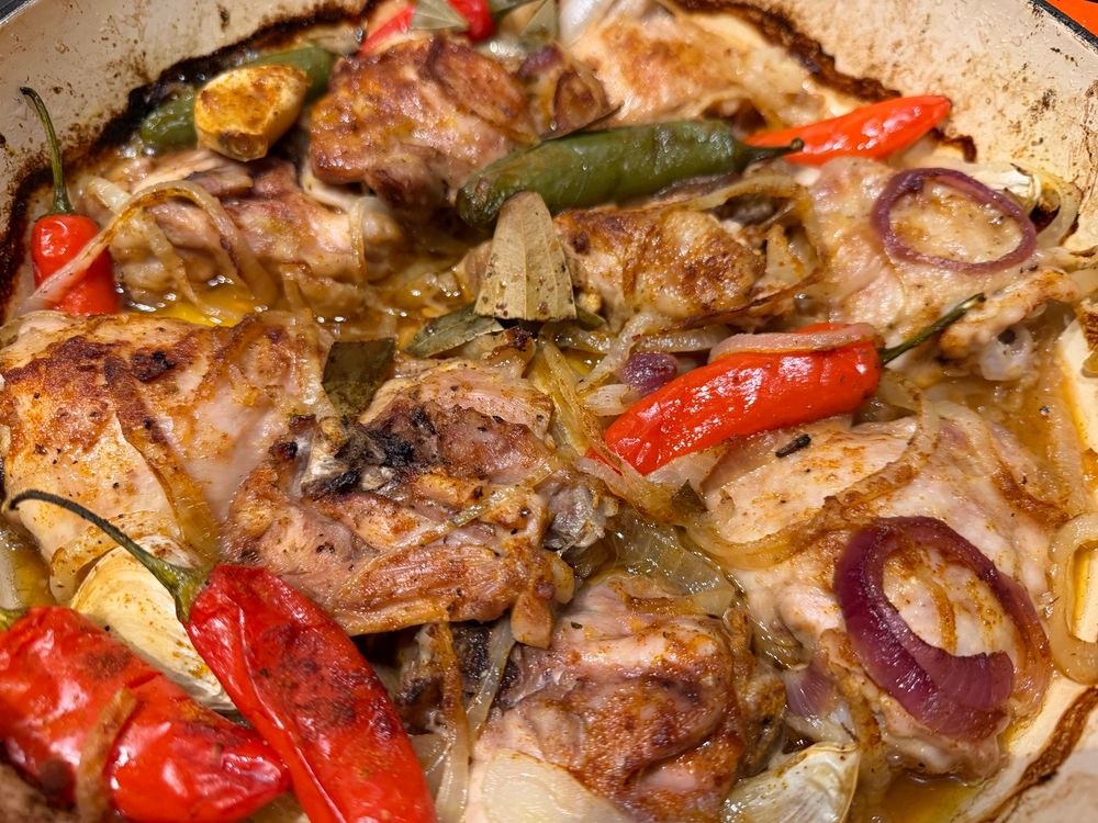 A casserole dish full of the chicken dish. 