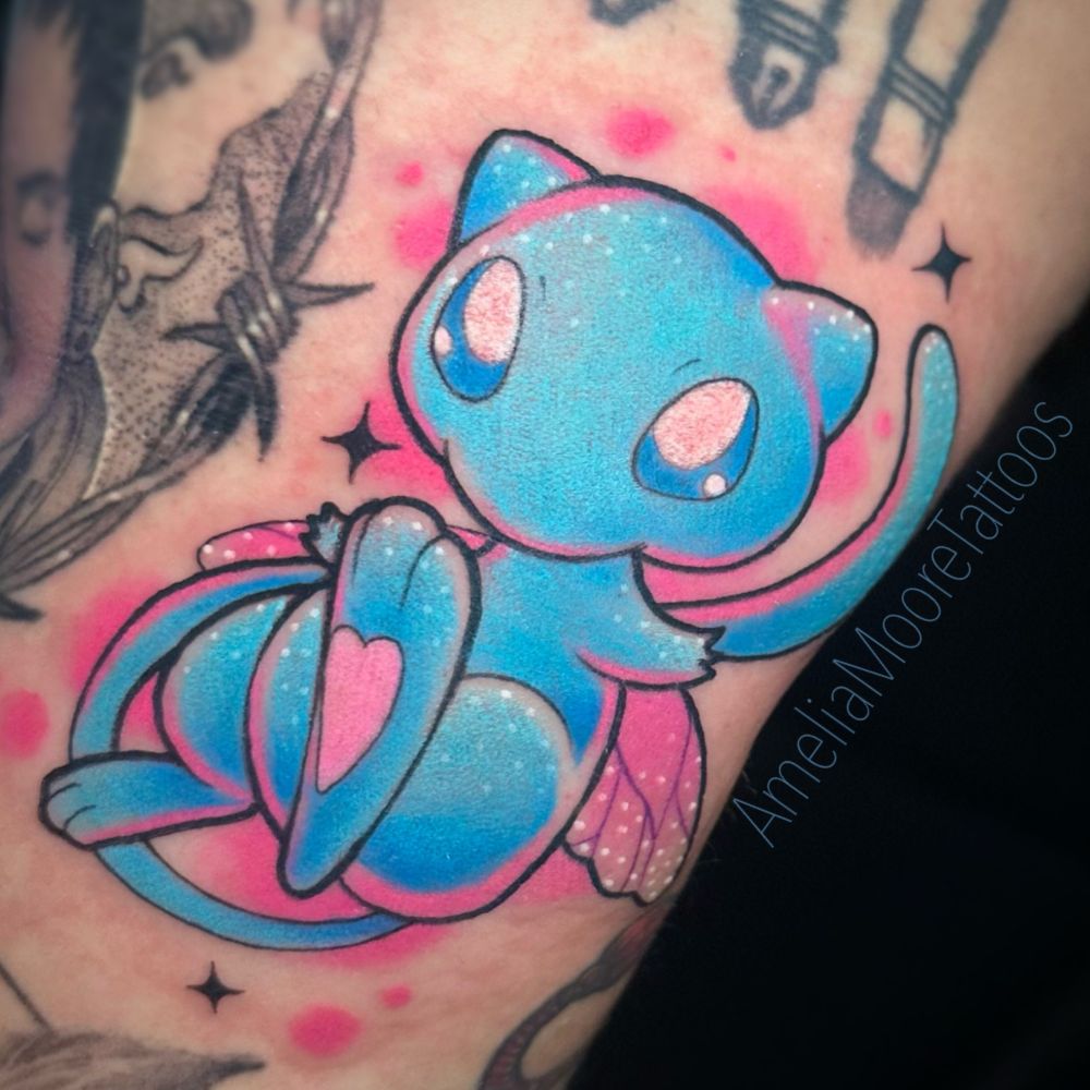 A tattoo of a shiny Mew with little pink fairy wings & a pink glow from behind!