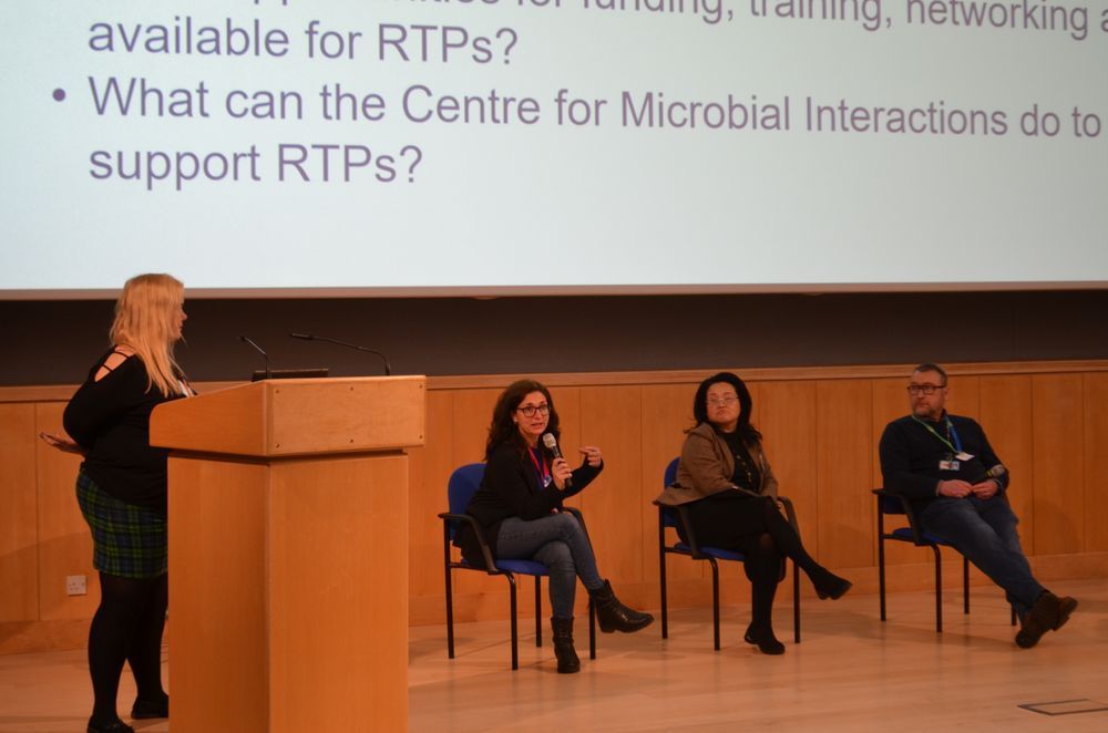 A panel discussion during the Centre for Microbial Interactions featuring Dr Carmen Palop, Dr Jennifer Ahn Jarvis and Dave Baker