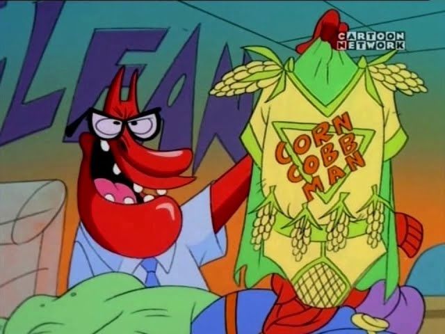 Red Guy (wearing glasses, light blue shirt, and a blue tie) holding a corn-themed costume with a cape. The words, "Corn Cobb Man", are written in the center. 

Cow & Chicken - Who Is Supercow? (1997). 