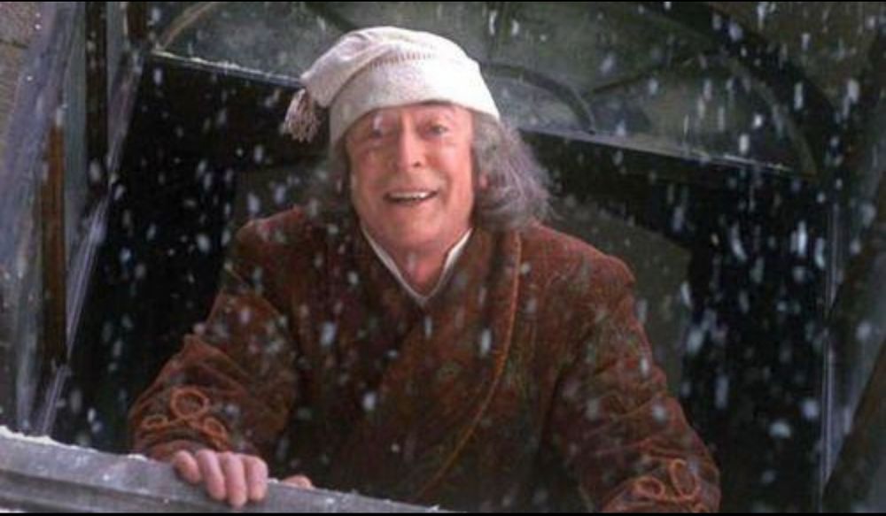 Ebenezer Scrooge leans out his window after his salvation (likely excited to watch the Eagles curb stomp the Cowboys on national TV)