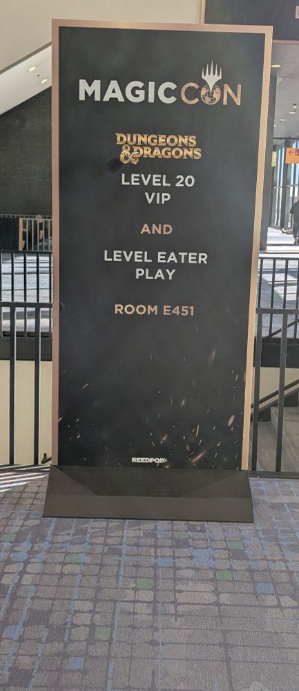 Standee banner reads Dungeons and Dragons Level 20 VIP and Level Eater Play Room E451 at MagicCon