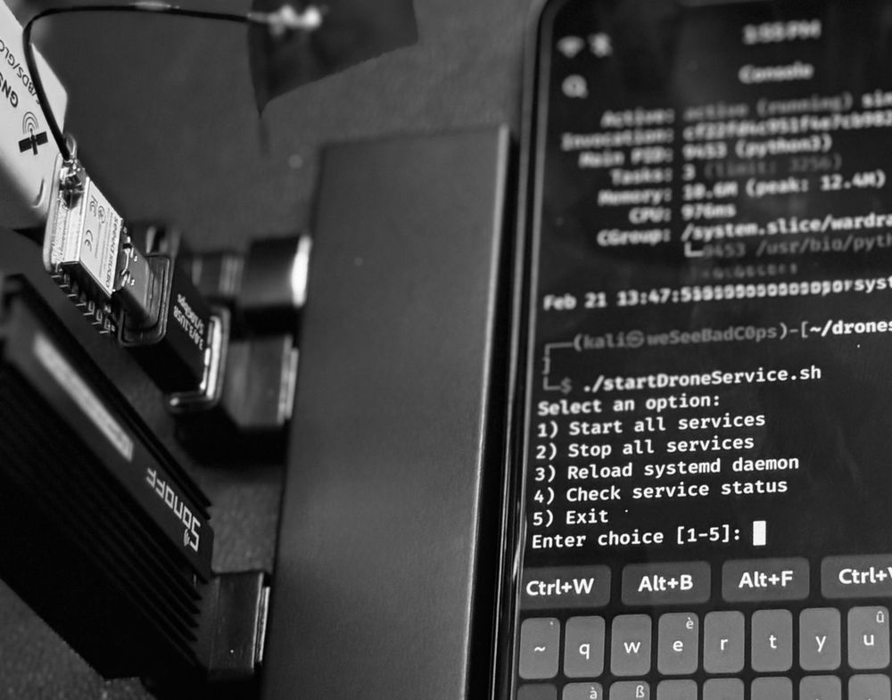 USB dongle next to a pinephone showing a command line prompt to manage starting and stopping drone detection services. A Sonoff dongle, esp32 and GPS unit are plugged in. 