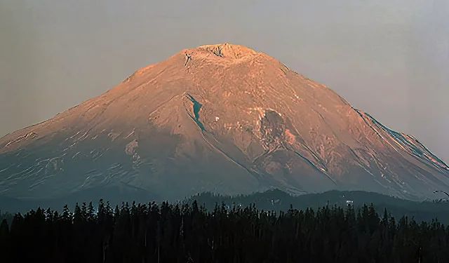 Mount St. Helens on the morning of May 18, 1980. Taken by Gary Rosenquist, enhanced by Steve Rosenow.