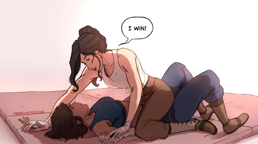 Two images of Korra and Asami after a sparring match. In this first one, Korra is pinned to the floor smiling at Asami hovering above her. Asami is saying, “I won!”