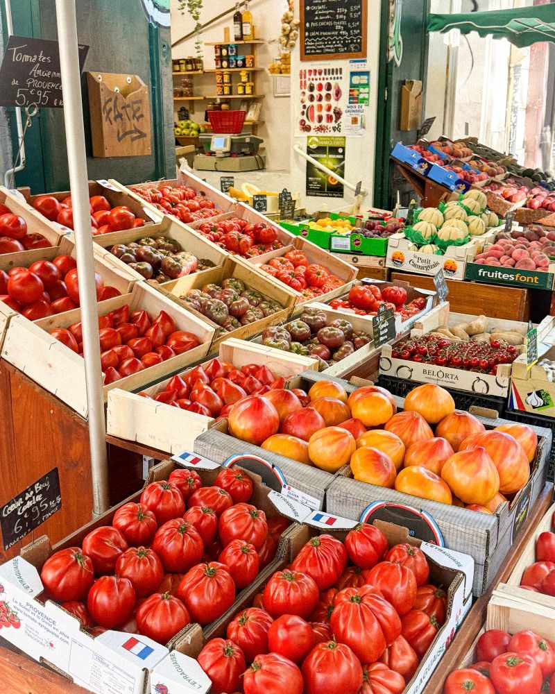 tomatoes at a market stand