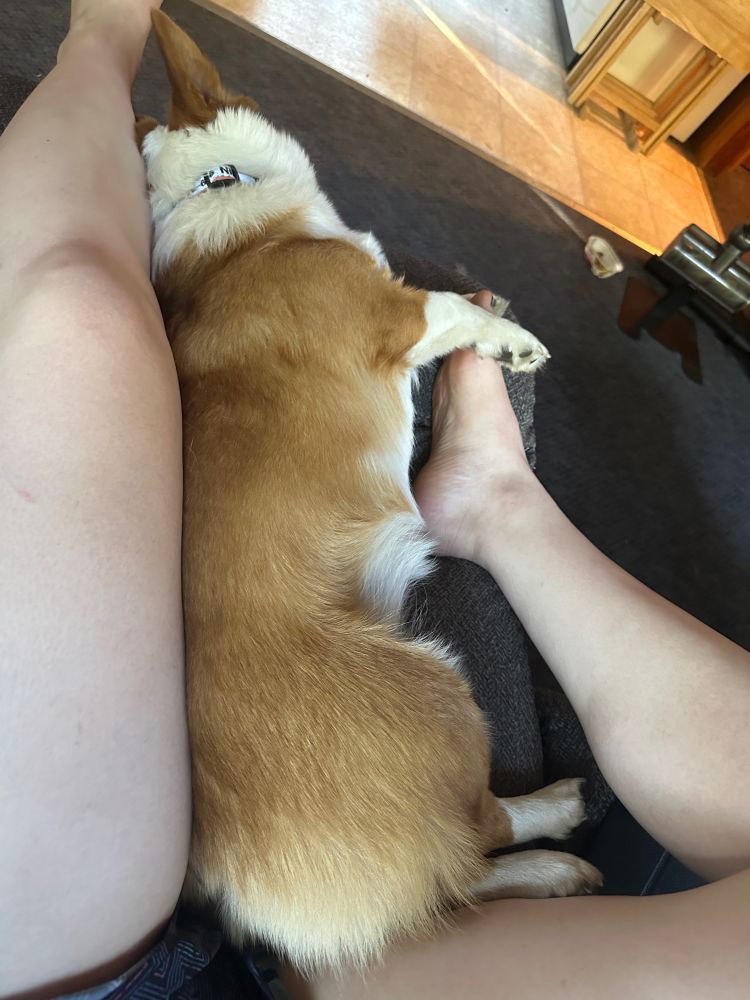 Min stretched long between my legs