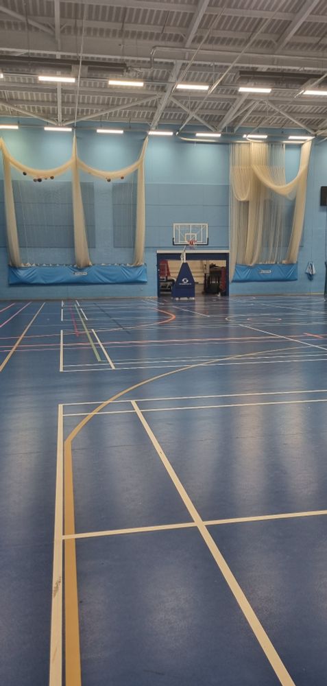 Empty indoor basketball court