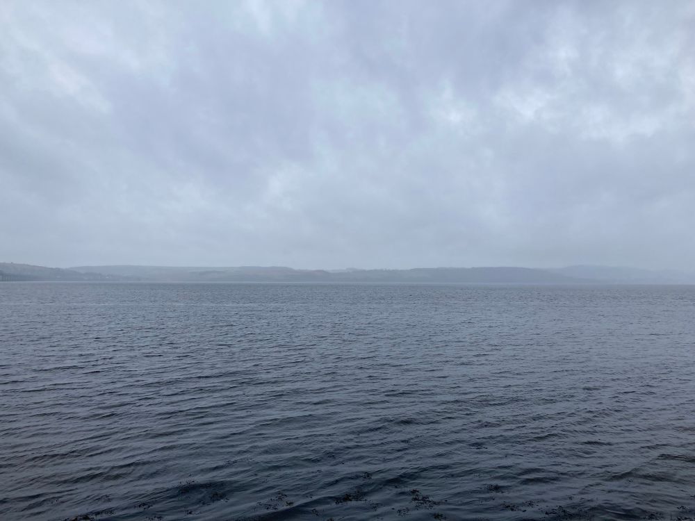 View across Tay Firth in a think drizzle ahead of today’s storm. A graduation of grey from dark water to pale cloud via a mid line of hills