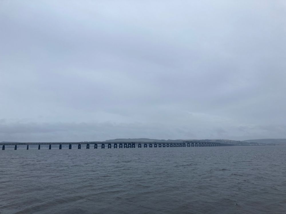 View across Tay Firth towards the rail bridge, all grey on a rainy morning 