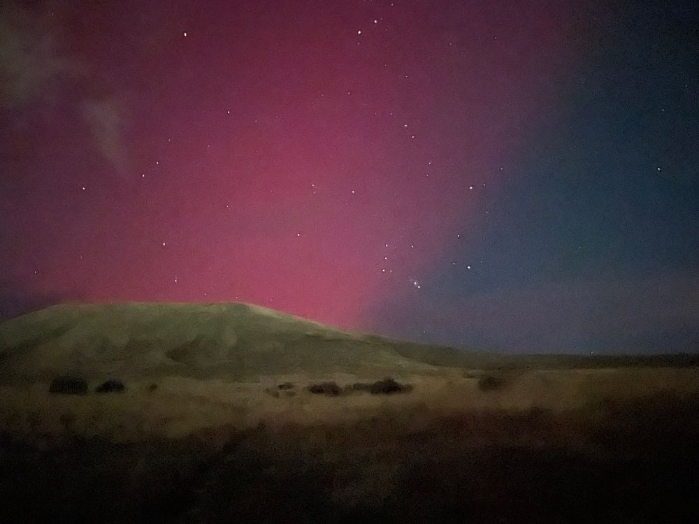 Aurora borealis over the foothills at Hammer Flat, Boise, Idaho. 