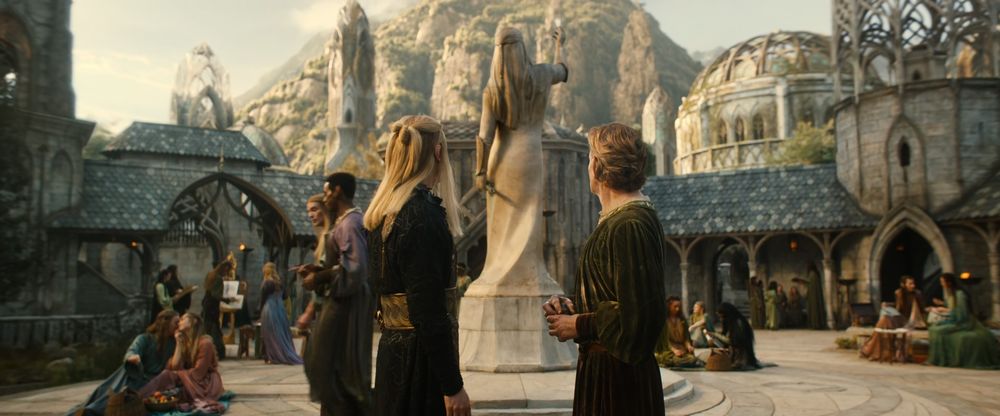Sauron and Celebrimbor looking up at the statue of Feanor