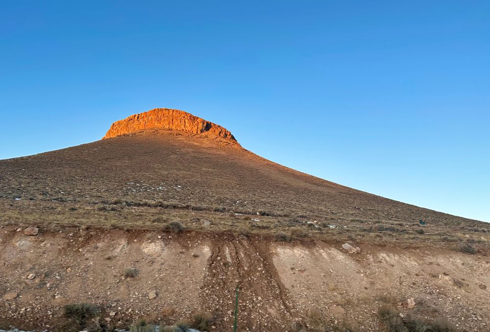 One of hundred of volcanic buttes surrounding Blue Mesa Reservoir. Curecanti National Recreation Area, Gunnison County, CO.