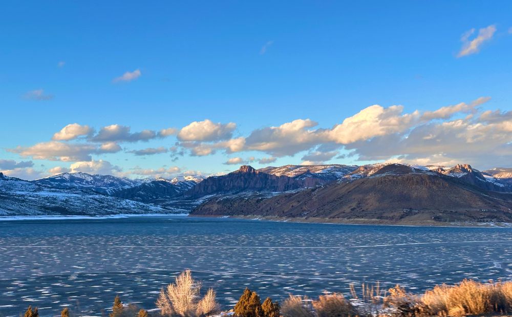 Frozen Blue Mesa Reservoir and the West Elk Mountains between Montrose & Gunnison, CO.
