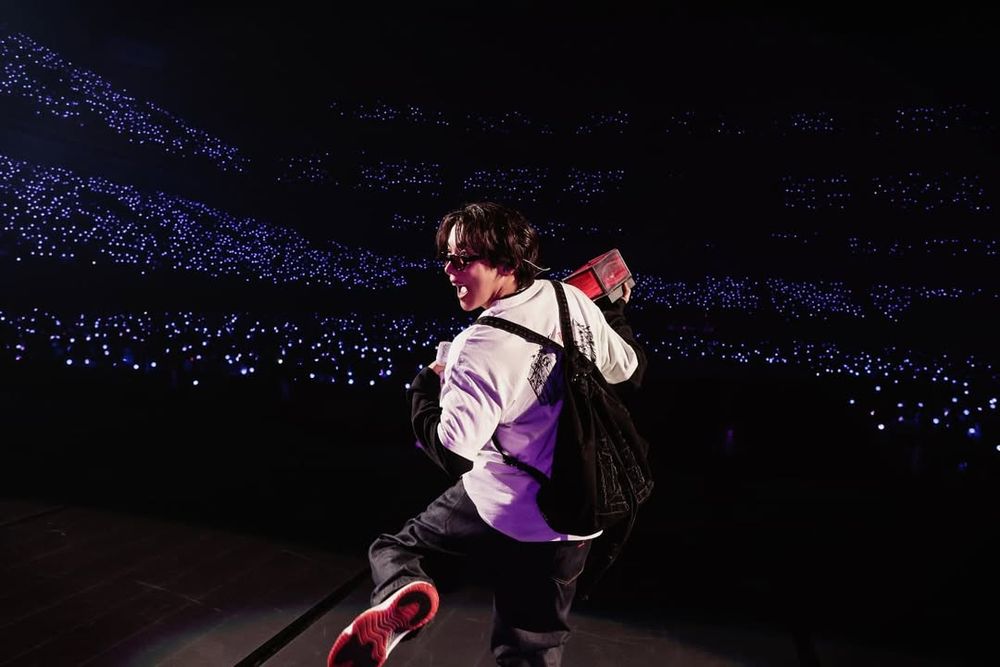 Jhope wearing a backpack.