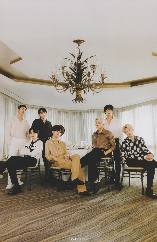 Namjoon, Jungkook, Jin standing behind Jimin, Taehyung, Hoseok and Yoongi who are sitting in chairs.

from: 9th ARMY Membership Kit