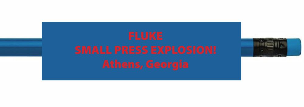 A blue pencil with the following printed on it in red text:
FLUKE
SMALL PRESS EXPLOSION!
Athens, Georgia 