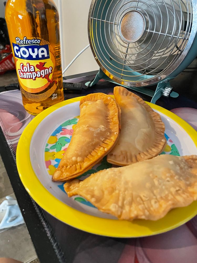 Emapanadas and cola Champagne 