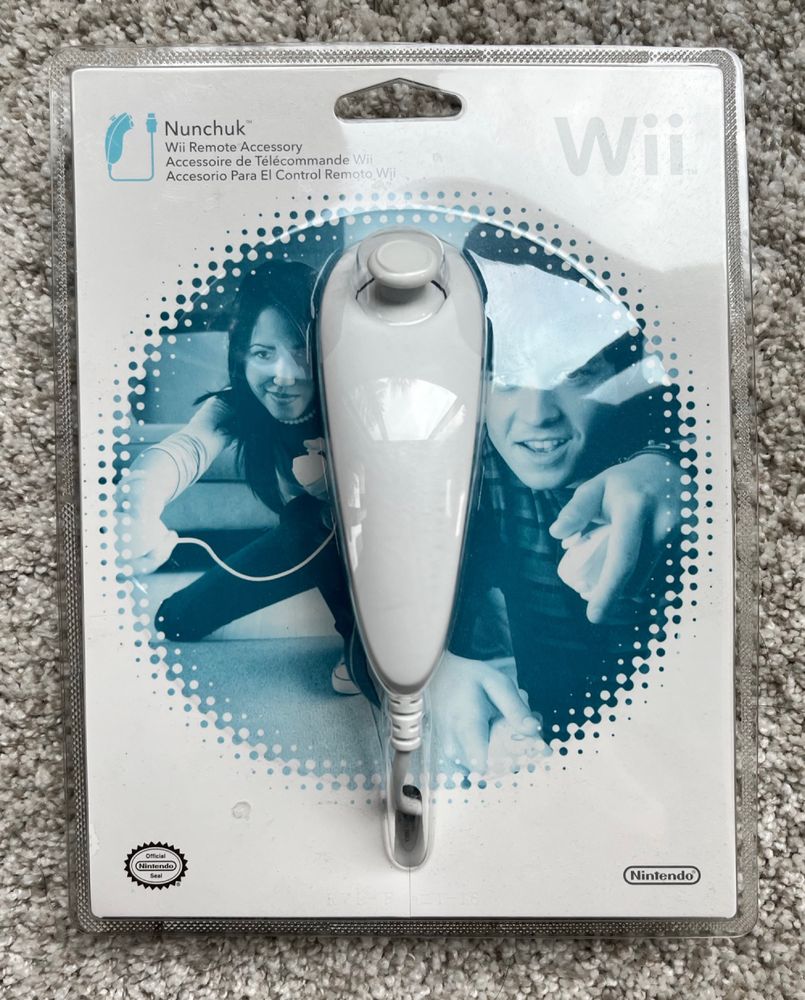 a still in package sealed wii nunchuck controller