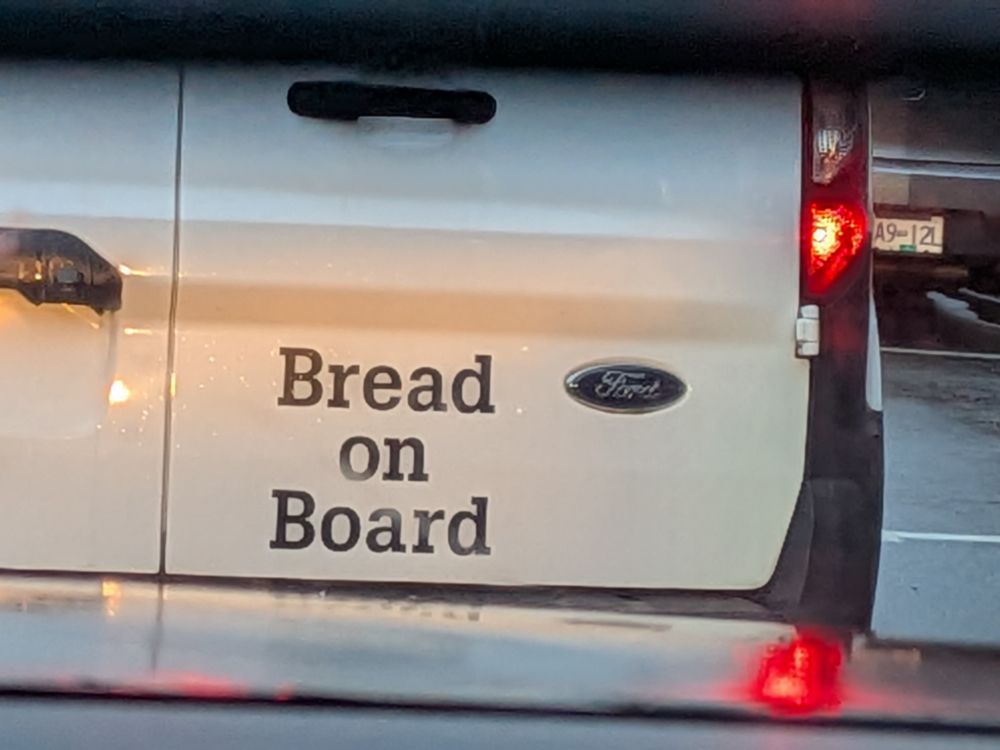 The back of a vehicle I saw reads bread on board 