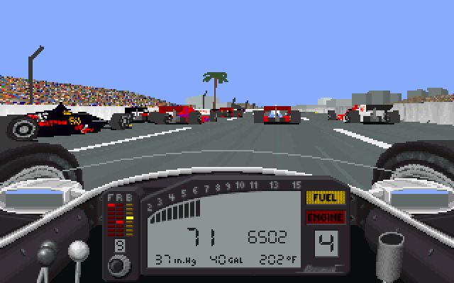 Screenshot of IndyCar Racing (DOS, 1993, Papyrus Design Group) by MobyGames contributor SiliconClassics. We are racing at Long Beach, trailing the pack. The IndyCar has been updated somewhat, with the analog gauge cluster now replaced with an LCD panel, indicating engine revs as both a bar graph and a numeric reading, numeric speedometer, and readings for remaining fuel, engine temperature, and current gear, with warning lights for low fuel and engine problems. There are some additional levers visible on either side, but to my recollection, they don't appear to move.
