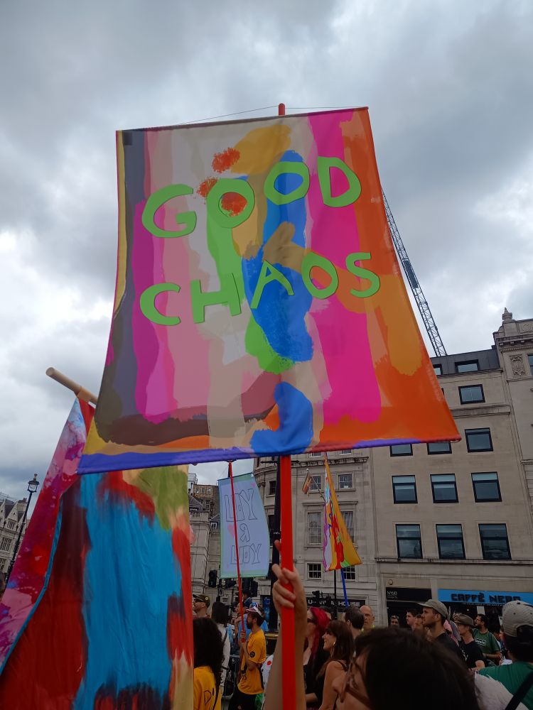 A painted sign saying Good Chaos